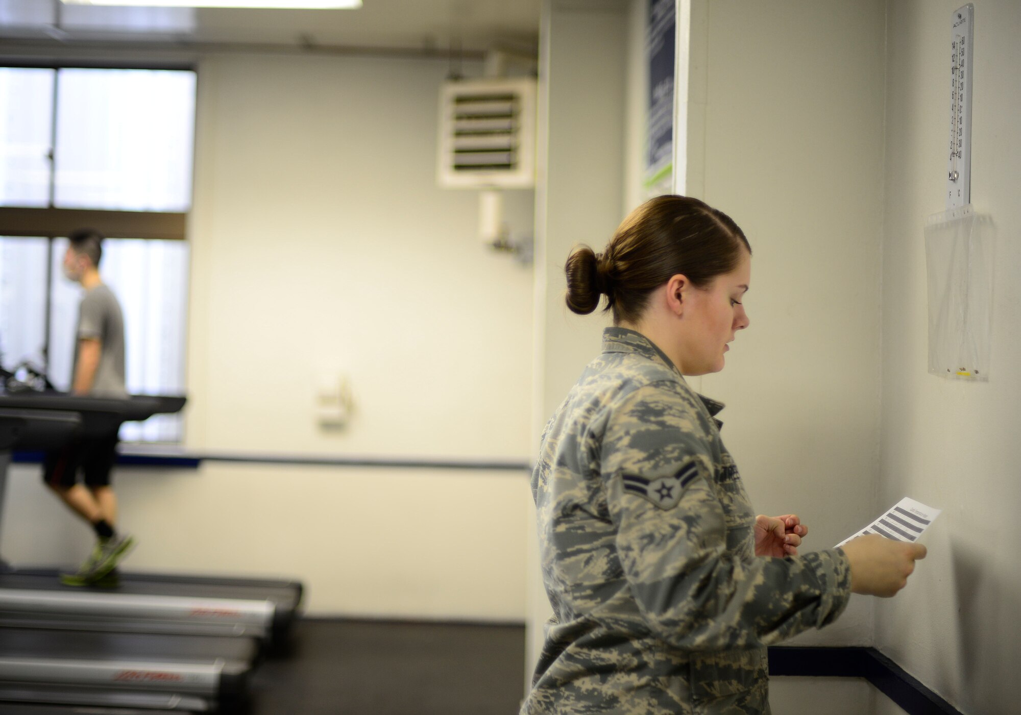 U.S. Air Force Airman 1st Class Danielle Streeter, a services apprentice with the 35th Force Support Squadron, conducts a room inspection at Misawa Air Base, Japan, March 31, 2016. These inspections are done to check for safety hazards throughout the fitness centers here.  In her capacity as a fitness specialist, Streeter performs a variety of tasks ranging from conducting physical fitness tests to supervising fitness center activities. (U.S. Air Force photo by Senior Airman Brittany A. Chase)