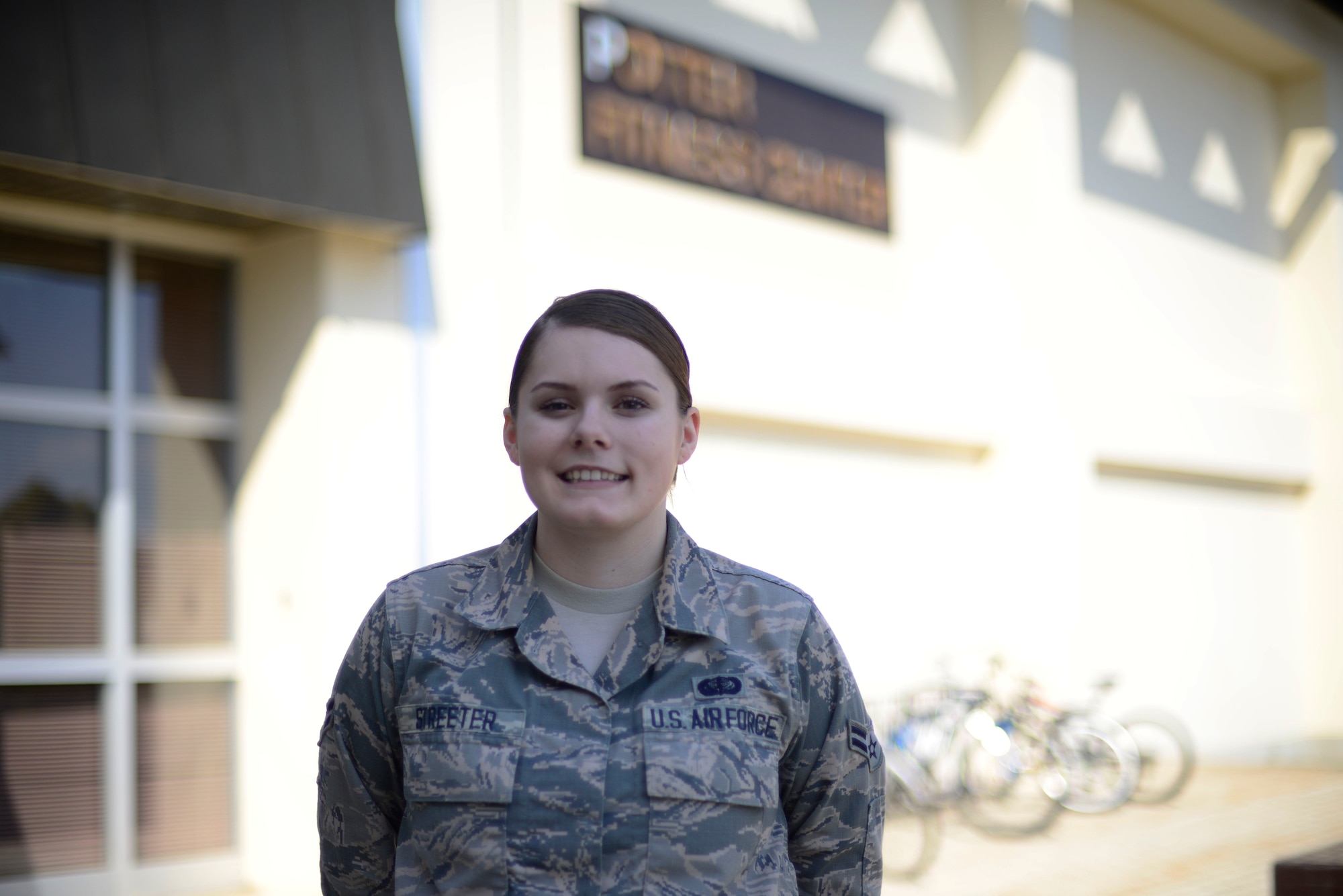 U.S. Air Force Airman 1st Class Danielle Streeter, a service apprentice with the 35th Force Support Squadron, poses for a Wild Weasel of the Week portrait at Misawa Air Base, Japan, March 31, 2016. Streeter was recognized as the Wild Weasel of the Week by the 35th FSS for her superior performance, outstanding work ethic and overall good discipline and conduct. (U.S. Air Force photo by Senior Airman Brittany A. Chase)
