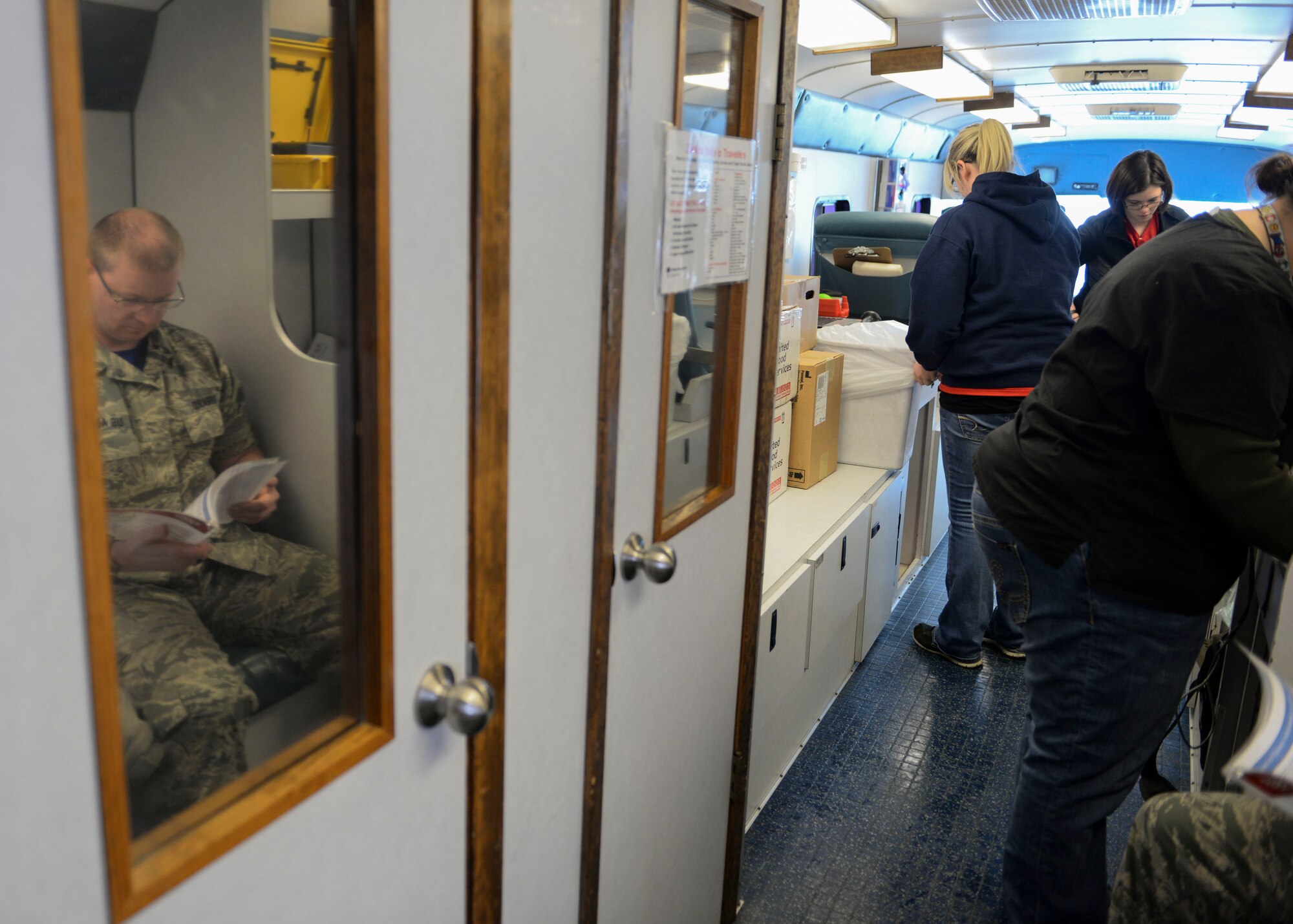 United Blood Services visited Minot Air Force Base, N.D., March 18, 2016 for a blood drive on a bus. United Blood Services brought a bus to Minot AFB to gather more donations with ease of a mobile unit. (U.S. Air Force photo/Airman 1st Class Jessica Weissman)