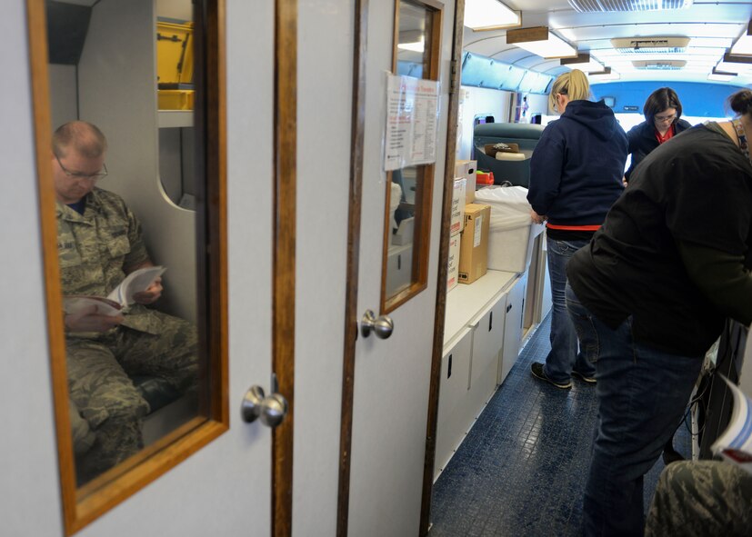 United Blood Services visited Minot Air Force Base, N.D., March 18, 2016 for a blood drive on a bus. United Blood Services brought a bus to Minot AFB to gather more donations with ease of a mobile unit. (U.S. Air Force photo/Airman 1st Class Jessica Weissman)