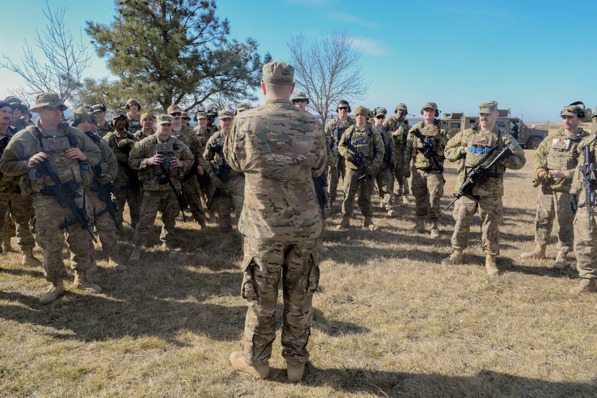 Convoy response force members from the 791st Missile Security Forces Squadron receive a safety briefing before beginning training in Garrison, N.D., March 30, 2016. CRF Airmen participated in three iterations of training to prepare for the Air Force Global Strike Command Road Warrior exercise. (U.S. Air Force photo/Airman 1st Class Jessica Weissman)