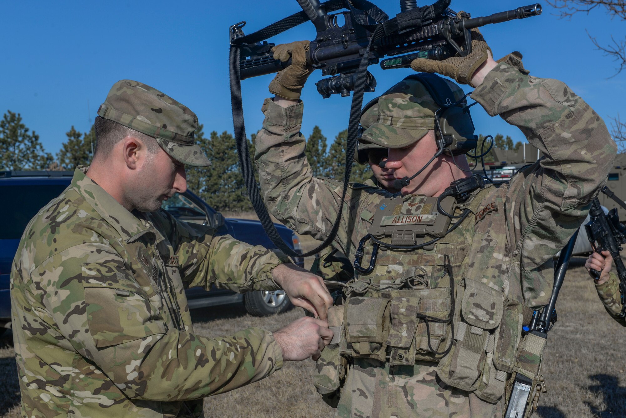 Senior Airman Evan Allison, a convoy response force member assigned to the 791st Missile Security Forces Squadron, has his tactical vest inspected before beginning training in Garrison, N.D., March 30, 2016. Airmen were inspected for live rounds and sharp objects to ensure safety throughout the training day. (U.S. Air Force photo/Airman 1st Class Jessica Weissman)