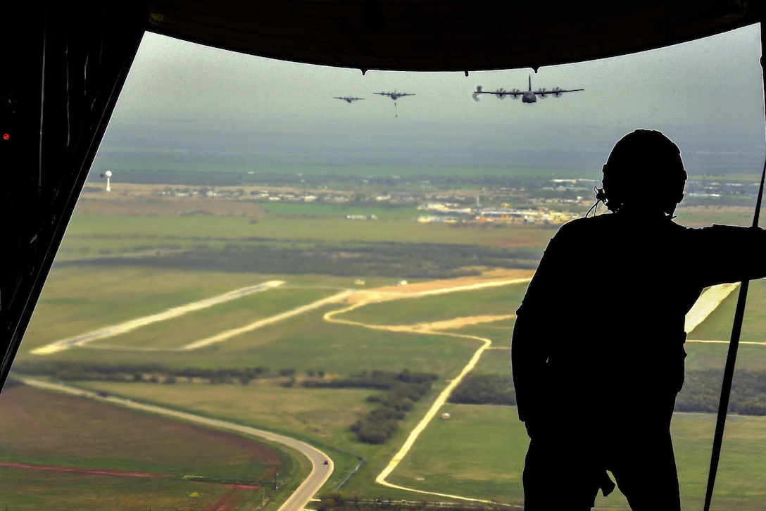 Air Force Senior Airman Frank Morgan operates the ramp of the C-130J Hercules aircraft during a training mission over Texas, March 30, 2016. Morgan a loadmaster is assigned to the 39th Airlift Squadron. Air Force photo by Senior Airman Keith James 