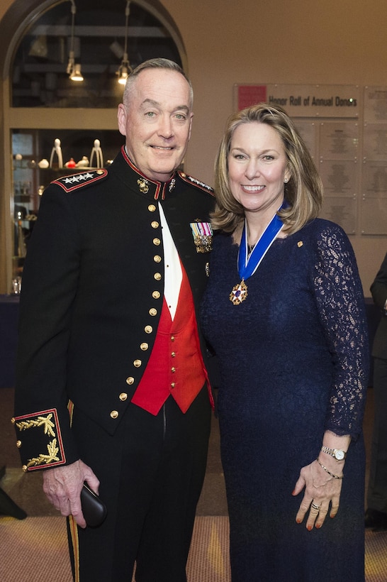 Marine Corps Gen. Joe Dunford, chairman of the Joint Chiefs of Staff, poses for a photo with Bonnie Carroll, Founder and President of the Tragedy Assistance Program for Survivors 2016 Honor Guard Gala in Washington, D.C., Apr. 6, 2016. DoD photo by Army Staff Sgt. Sean K. Harp