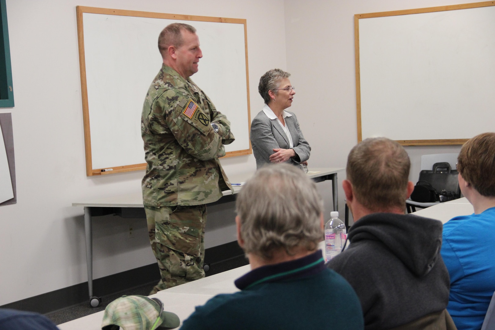 Army Col. Corey New, DLA Distribution Susquehanna, Pa., commander, and Twila Gonzales, Senior Executive Service, DLA Distribution deputy commander, talk to DLA Distribution Susquehanna’s first graduating class from High Performing Leadership – Phase 1. 