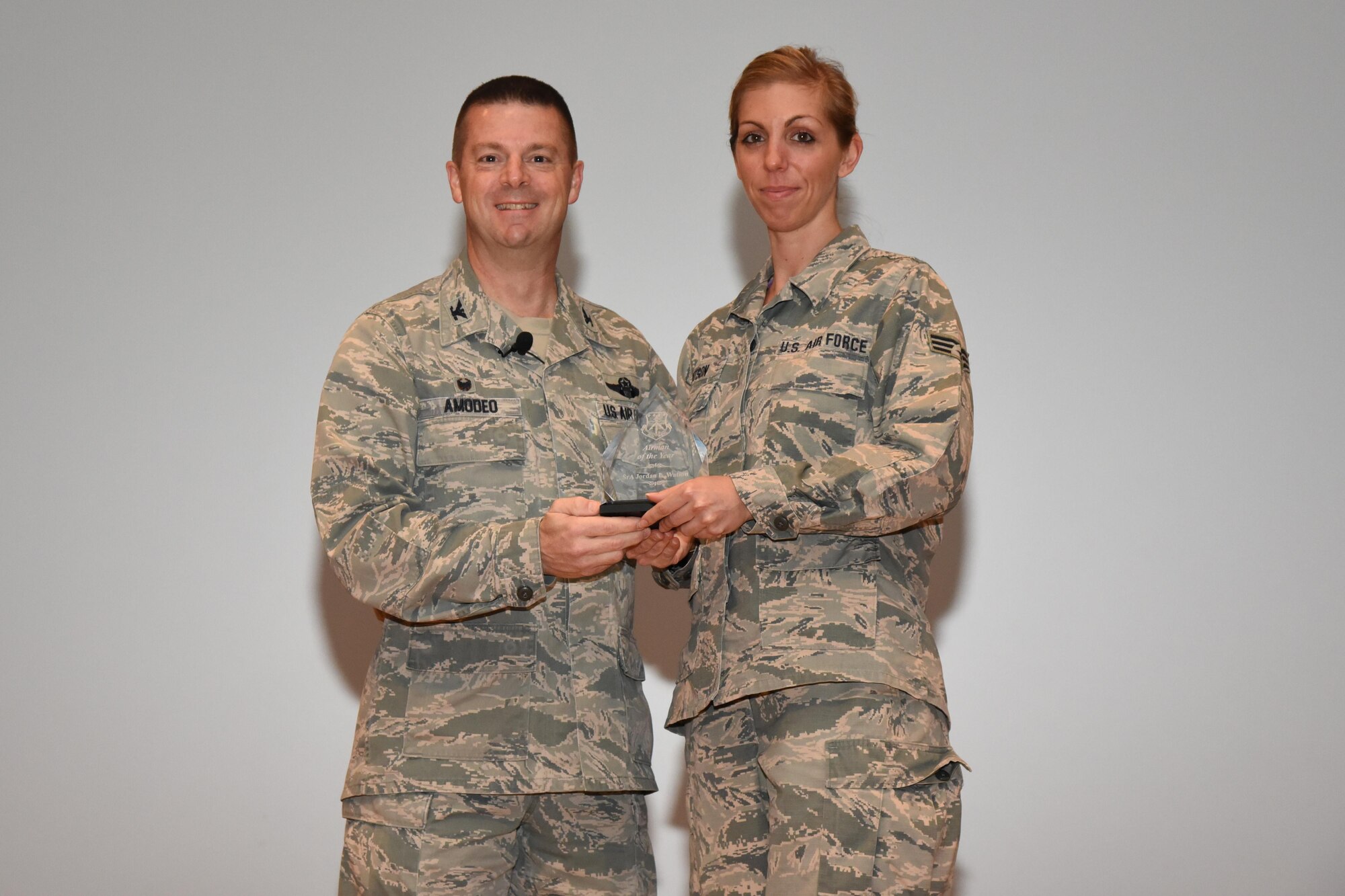 The 403rd Wing held its annual commander’s call at Welch Theater April 2, 2016, during the Unit Training Assembly. Col. Frank Amodeo, 403rd Wing Commander, presented awards to the 2015 quarterly and annual award winners. The 403rd Wing Airman of the Year for 2015 is Senior Airman Jordan Watson with the 41st Aerial Port Squadron. (U.S. Air Force photo/Tech. Sgt. Ryan Labadens)