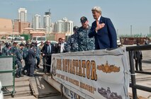 (April 07, 2016) U.S. Secretary of State John Kerry crosses the brow of the Avenger-class Mine Countermeasures ship USS Devastator (MCM 6) at Naval Support Activity Bahrain. The secretary visited Sailors of the U.S. 5th Fleet as part of his current travel to the region.