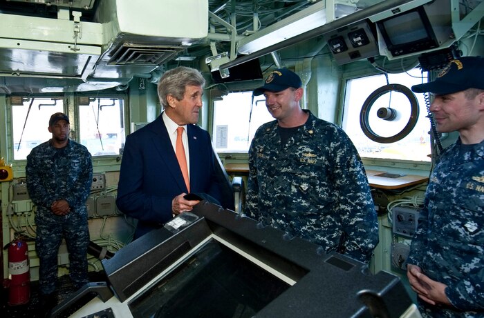(April 07, 2016) U.S. Secretary of State John Kerry speaks with Lt. Cmdr. Robert Burke, commanding officer of the Avenger-class Mine Countermeasures ship USS Devastator (MCM 6) on the bridge during a visit to Naval Support Activity Bahrain. The secretary visited Sailors of the U.S. 5th Fleet as part of his current travel to the region.