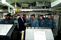 (April 07, 2016) U.S. Secretary of State John Kerry shakes hands with Sailors on the bridge of the Avenger-class Mine Countermeasures ship USS Devastator (MCM 6) during a visit to Naval Support Activity Bahrain. The secretary visited Sailors of the U.S. 5th Fleet as part of his current travel to the region.