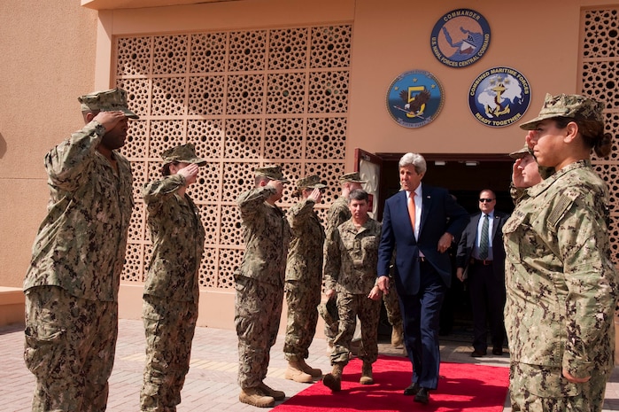 (April 07, 2016) U.S. Secretary of State John Kerry and Vice Adm. Kevin Donegan, commander, Naval Forces Central Command pass through sideboys during a visit to NAVCENT’s headquarters at Naval Support Activity Bahrain. The secretary visited Sailors of the U.S. 5th Fleet as part of his current travel to the region.