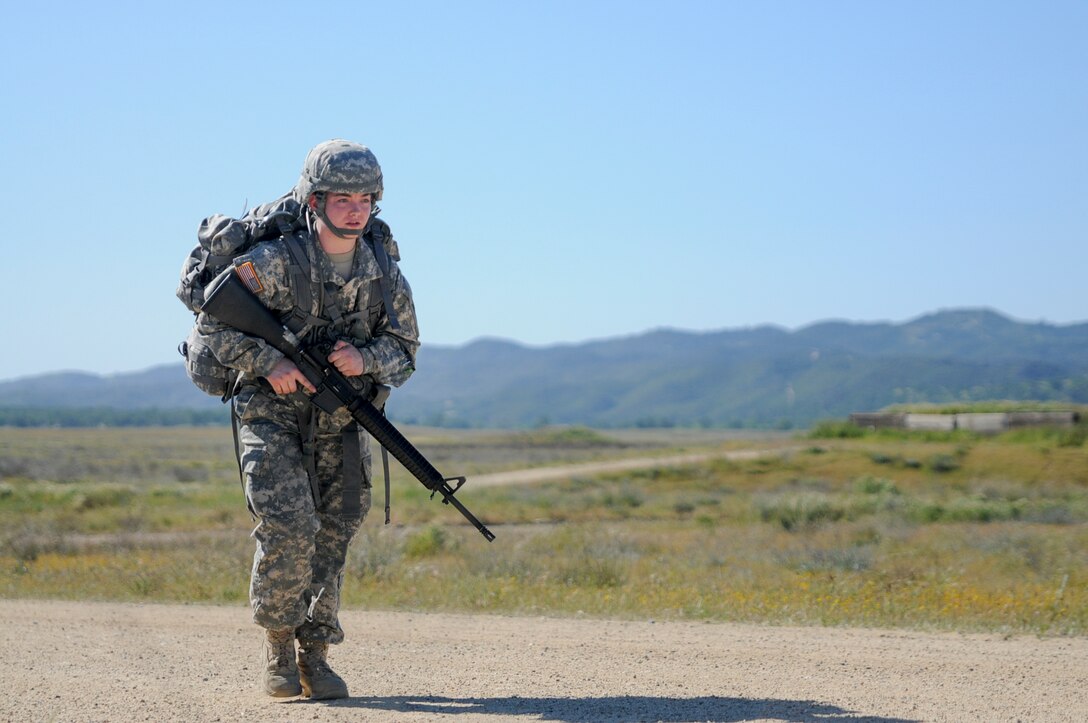 Sgt. Samantha Morgan, from 351st Civil Affairs Command, competes in a ruck march at the U.S. Army Civil Affairs and Psychological Operations Command 2016 U.S. Army Best Warrior Competition at Fort Hunter Liggett, Calif., April 5, 2016. This year’s Best Warrior competition will determine the top noncommissioned officer and junior enlisted Soldier who will represent USACAPOC in the Army Reserve Best Warrior competition later this year. (U.S. Army photo by Spc. Khadijah Lutz-Wilcox, USACAPOC)