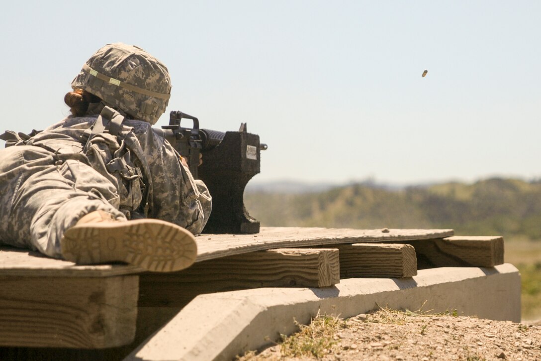 Spc. Ariana Ramirez, from 351st Civil Affair Command, fires a rifle at the U.S. Army Civil Affairs and Psychological Operations Command 2016 U.S. Army Best Warrior Competition at Fort Hunter Liggett, Calif., April 5, 2016. This year’s Best Warrior competition will determine the top noncommissioned officer and junior enlisted Soldier who will represent USACAPOC in the Army Reserve Best Warrior competition later this year. (U.S. Army photo by Spc. Khadijah Lutz-Wilcox, USACAPOC)