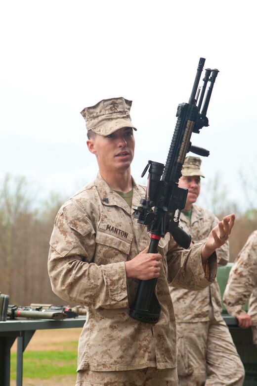 Cpl. Manton Lawrence, Weapons Training Battalion instructor, gives a demonstration during the course. The WTBN oversees training for the Foreign Weapons Course, Sniper Schools, Combat Shooting Team and Rifle Shooting Team.