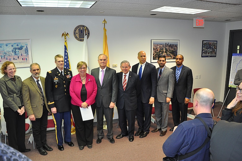 Col. David Caldwell, U.S. Army Corps of Engineers New York District (third person from the left), joins other elected, state, and federal officials for the Environmental Protection Agency announcement of the $1.4 billion Superfund Project for the Lower Passaic River in Newark, N.J., March 4, 2016. The Lower Passaic River Superfund project will remove 3.5 million cubic yards of toxic sediment, in an effort to revitalize the lower eight miles of the Passaic River. (Photo by Hector Mosley, public affairs specialist, New York District)