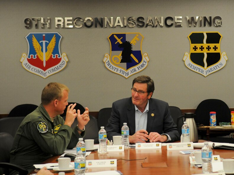 Congressman John Garamendi and Col. Christopher Stricklin, 9th Reconnaissance Wing vice commander (left), discuss infrastructure projects at the 9th RW Headquarters building on Beale Air Force Base, California, Apr. 06, 2016. Garamendi represents the Third District of California. (U.S. Air Force photo by Senior Airman Michael J. Hunsaker)
