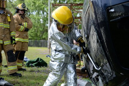 Airman 1st Class Brooke Hunt of the 177th Fighter Wing Fire Department, New Jersey Air National Guard, uses a Halligan tool to break a vehicle window during basic vehicle extrication training exercises at the 165th Airlift Wing's Regional Fire Training Facility in Savannah, Georgia, on April 6th, 2016.  Airmen from the Connecticut, Maine, New Jersey, Rhode Island and Vermont Air National Guard Fire Departments are conducting training exercises together to maintain operational readiness. 