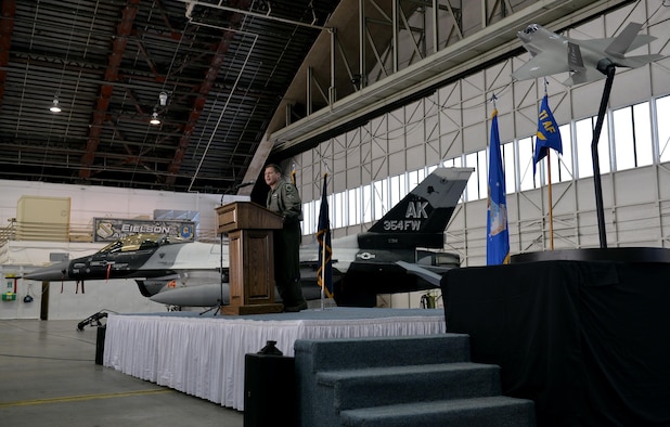 Air Force Col. Michael P. Winkler, the 354th Fighter Wing commander, announces the Secretary of the Air Force’s signed decision to select Eielson Air Force Base, Alaska, as the location of the Air Force’s first F-35A operational base in the Pacific Air Forces’ Area of Responsibility during an April 4, 2016, ceremony at Eielson. Basing the F-35s at Eielson will allow the Air Force the capability of using the largest airspace in the Air Force in the Joint Pacific Alaska Range Complex for large-force exercises, ensuring realistic combat training for the Department of Defense. (U.S. Air Force photo by Master Sgt. Karen J. Tomasik/Released)