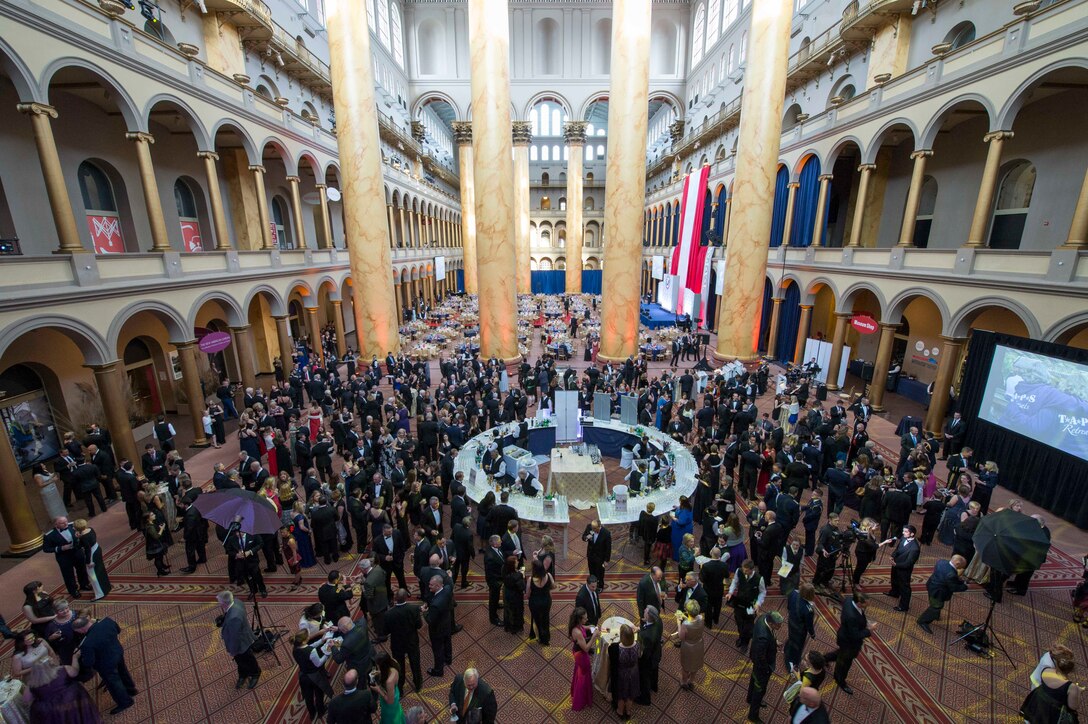 Guests meet at the at the  Tragedy Assistance Program for Survivors 2016 Honor Guard Gala at the National Building Museum in Washington, D.C., April 6, 2016. TAPS provides ongoing peer-based emotional support to those grieving the death of someone who died while serving in the armed forces. DoD photo by Navy Petty Officer 2nd Class Jesse A. Hyatt
