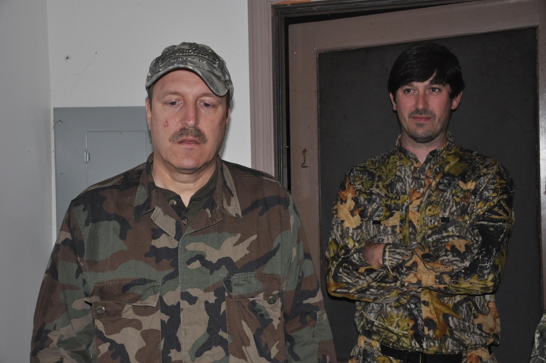 Savannah Corps Forester Aaron Murphy (right), awaits instruction upon arriving at Bussey Point Management Area for a turkey hunt held April 1. Murphy was one of a handful of hopefuls on the hunt for Eastern Wild Turkeys who inhabit the isolated stretch of forest. 