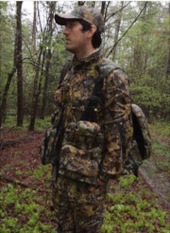 Aaron Murphy, a Savannah Corps forester, observes an area of activity during Thurmond Lake's Turkey Hunt  April 1 held at Bussey Point Management Area. The annual event offers a handful of hopefuls the chance to hunt Eastern Wild Turkeys who inhabit the isolated stretch of forest. 