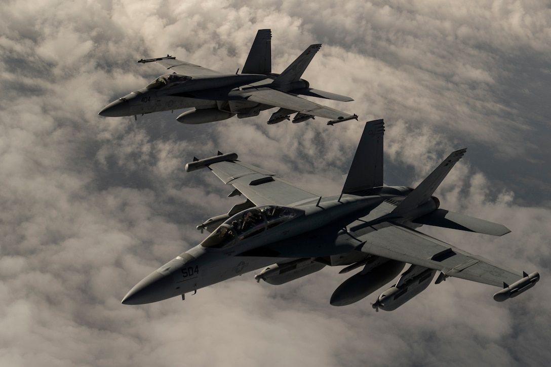 U.S. Navy F-18 Hornet fighters fly over Iraq, March 3, 2016. Army Col. Steve Warren, the spokesman for Operation Inherent Resolve, briefed reporters from Baghdad today about the progress of the counter-ISIL coalition and its partners on the ground in Syria and Iraq. Air Force photo by Staff Sgt. Corey Hook