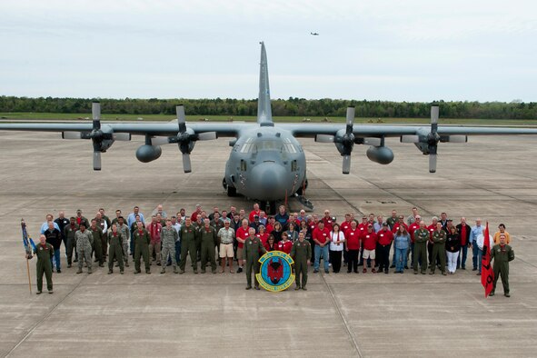 Members and former members of the 50th Airlift Squadron pose for a photo during the “Red Devil Reunion” for the 50 AS at Little Rock Air Force Base, Ark., Apr. 1, 2016. The reunion was an opportunity for 50 AS veterans to reconnect and meet with those who followed. (U.S. Air Force photo by Airman First Class Mercedes Taylor/Released) 