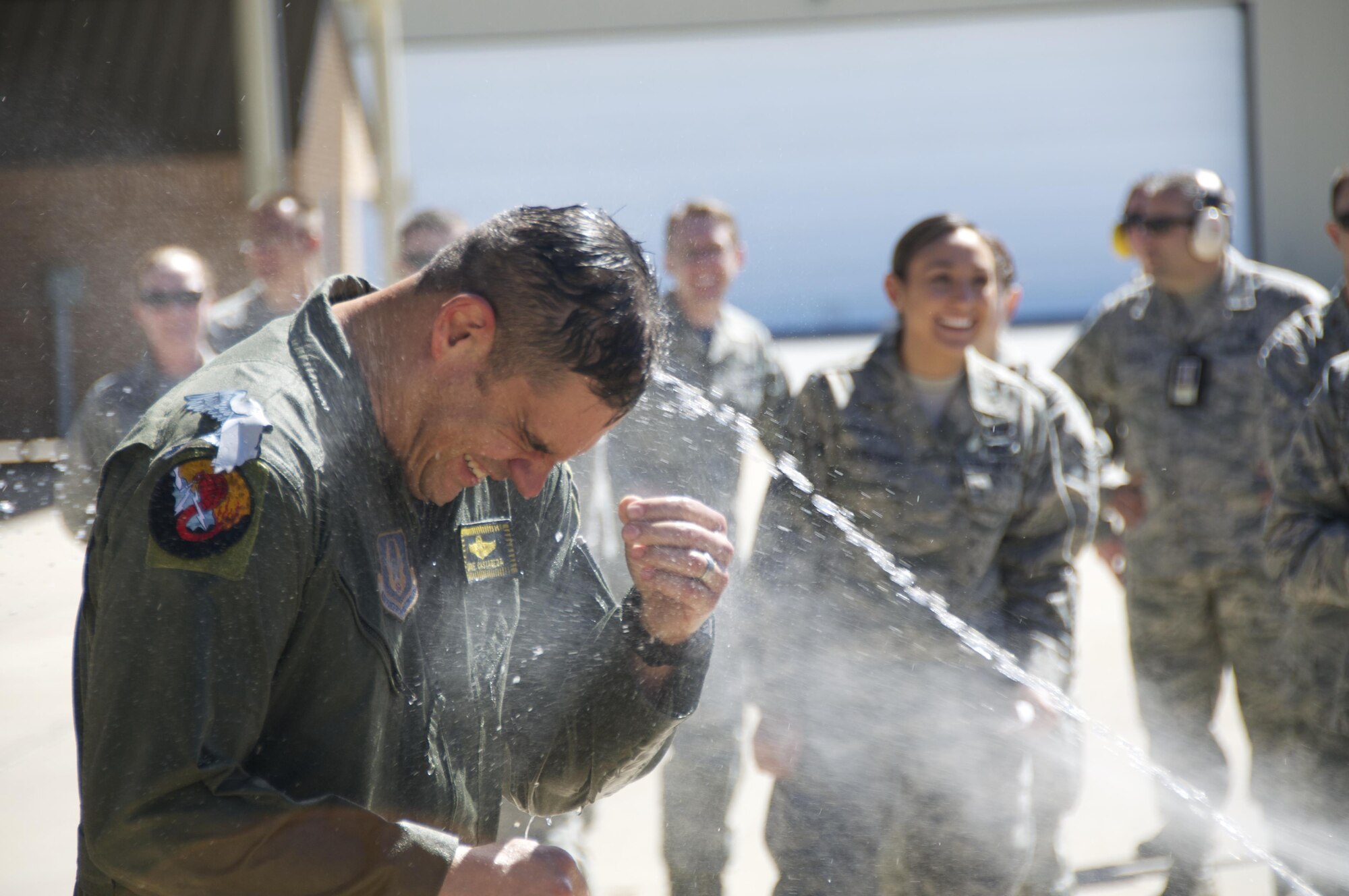 Col. David Castaneda, 419th Fighter Wing pilot, gets a cold welcome after taking his final flight in the F-16 Fighting Falcon at Hill Air Force Base, Utah, April 2. (U.S. Air Force photo/Airman 1st Class Justin Fuchs)