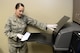 Staff Sgt. Cinnamon Kavlick, 388th Equipment Maintenance Squadron, inserts a digital imaging plate to be scanned March 25 in the 388th EMS Non-Destructive Inspection laboratory at Hill Air Force Base, Utah. The 388th EMS NDI lab recently upgraded its radiography equipment with digital capabilities, improving the process of locating small cracks and identifying minute discontinuities in aircraft engines, wings, and other components. (U.S. Air Force photo by Todd Cromar)