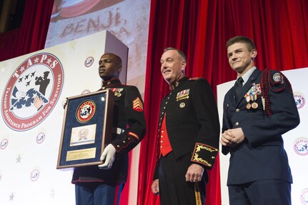 Marine Corps Gen. Joe Dunford, chairman of the Joint Chiefs of Staff, stands on stage during the Tragedy Assistance Program for Survivors 2016 Honor Guard Gala in Washington, D.C., April 6, 2016. DoD photo by Army Staff Sgt. Sean K. Harp