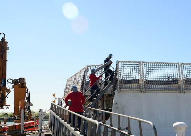 USCGC Hamilton (WMSL 753) conducts a weapons on-load at Joint Base Charleston – Weapons Station, SC, April 4, 2016. This evolution marked the first time in over 20 years that any military ship loaded weapons the JB Charleston - WS. (U.S. Navy Photo by Mass Communication Specialist 1st Class Sean M. Stafford)