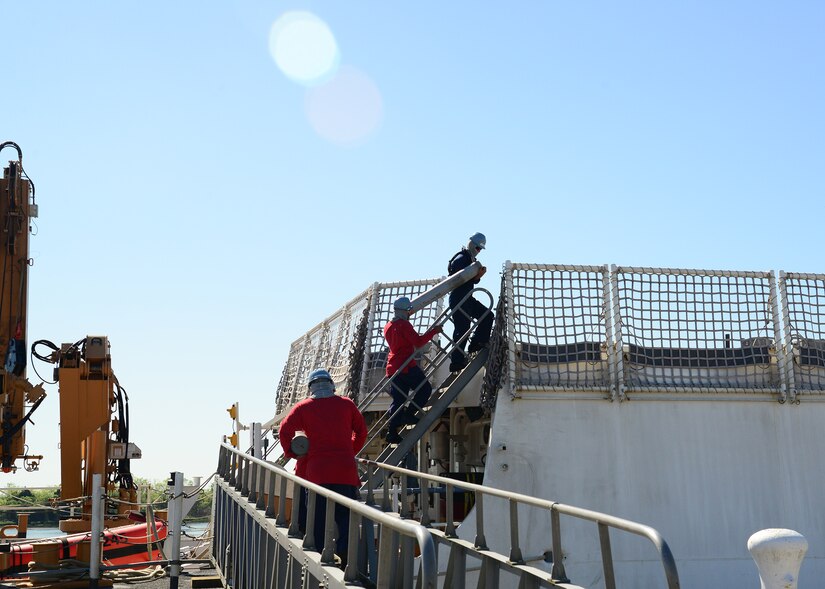 USCGC Hamilton (WMSL 753) conducts a weapons on-load at Joint Base Charleston – Weapons Station, SC, April 4, 2016. This evolution marked the first time in over 20 years that any military ship loaded weapons the JB Charleston - WS. (U.S. Navy Photo by Mass Communication Specialist 1st Class Sean M. Stafford)