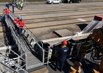 USCGC Hamilton (WMSL 753) conducts a weapons on-load at Joint Base Charleston – Weapons Station, SC, April 4, 2016. This evolution marked the first time in over 20 years that any military ship loaded weapons the JB Charleston - WS. (U.S. Navy Photo by Mass Communication Specialist 1st Class Sean M. Stafford)