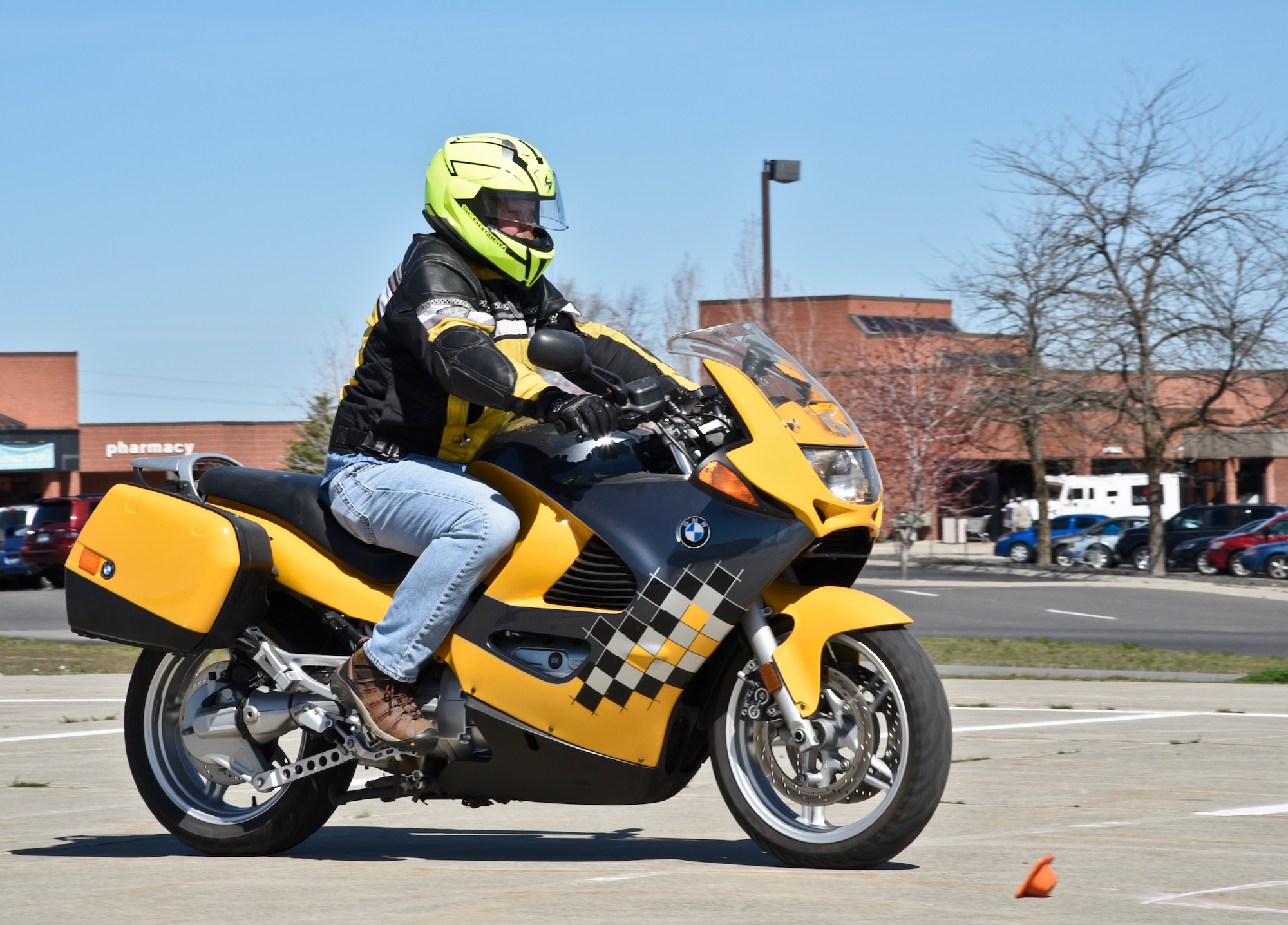 William Mace, 92nd Medical Support Squadron medical material manager, rides his motorcycle during the Motorcycle Expo April 7, 2016, at Fairchild Air Force Base, Wash. Currently, Fairchild has a riding population of more than 150 riders, and everyone is required to follow the same guidelines and wear the proper equipment when riding on base, and military motorcyclists must follow the same rules off base, as well. (U.S. Air Force Photo/Airman 1st Class Taylor Bourgeous)