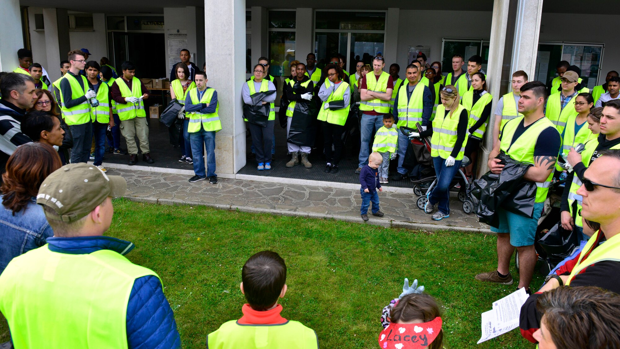 Volunteers meet before breaking up into teams to pick up trash during the Roveredo in Piano, Italy, Ecological Day, April 3, 2016. Team Aviano members teamed up with local Italians to strengthen relationships with our Italian hosts. (U.S. Air Force photo by Airman 1st Class Cary Smith/Released) 