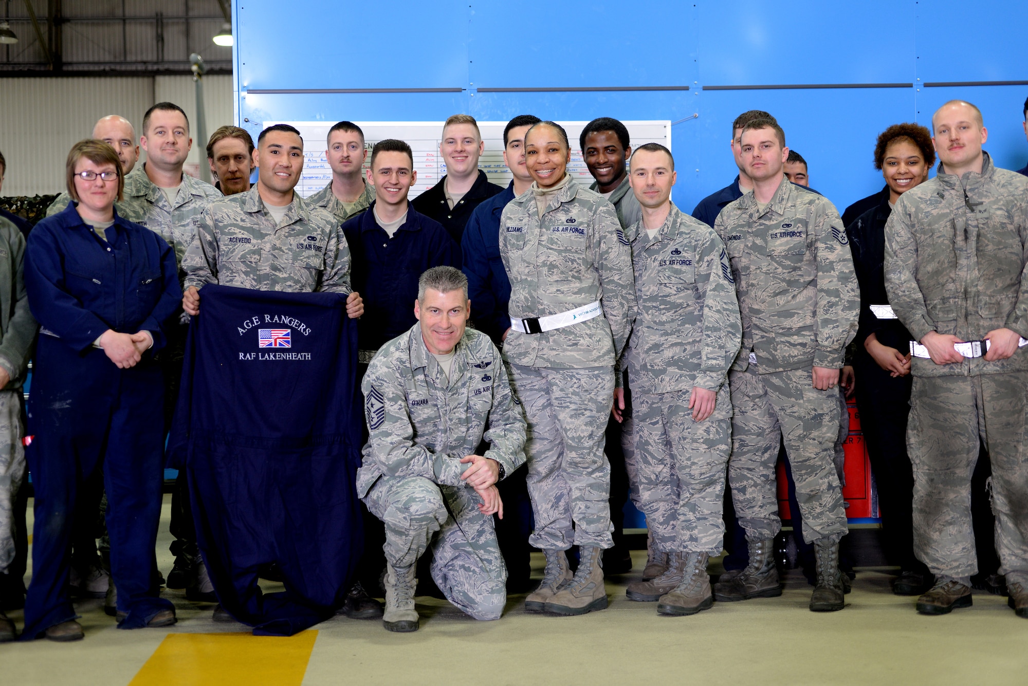 Chief Master Sergeant David O’Hara, 48th Fighter Wing command chief, poses for a group photo with Airmen from the 48th Aerospace Ground Equipment flight, at Royal Air Force Lakenheath, England, March 30, 2016. During his visit, O’Hara worked side-by-side with AGE Airmen and received an in-depth rundown of the unit’s operations and processes. (U.S. Air Force photo/ Tech. Sgt. Matthew Plew)