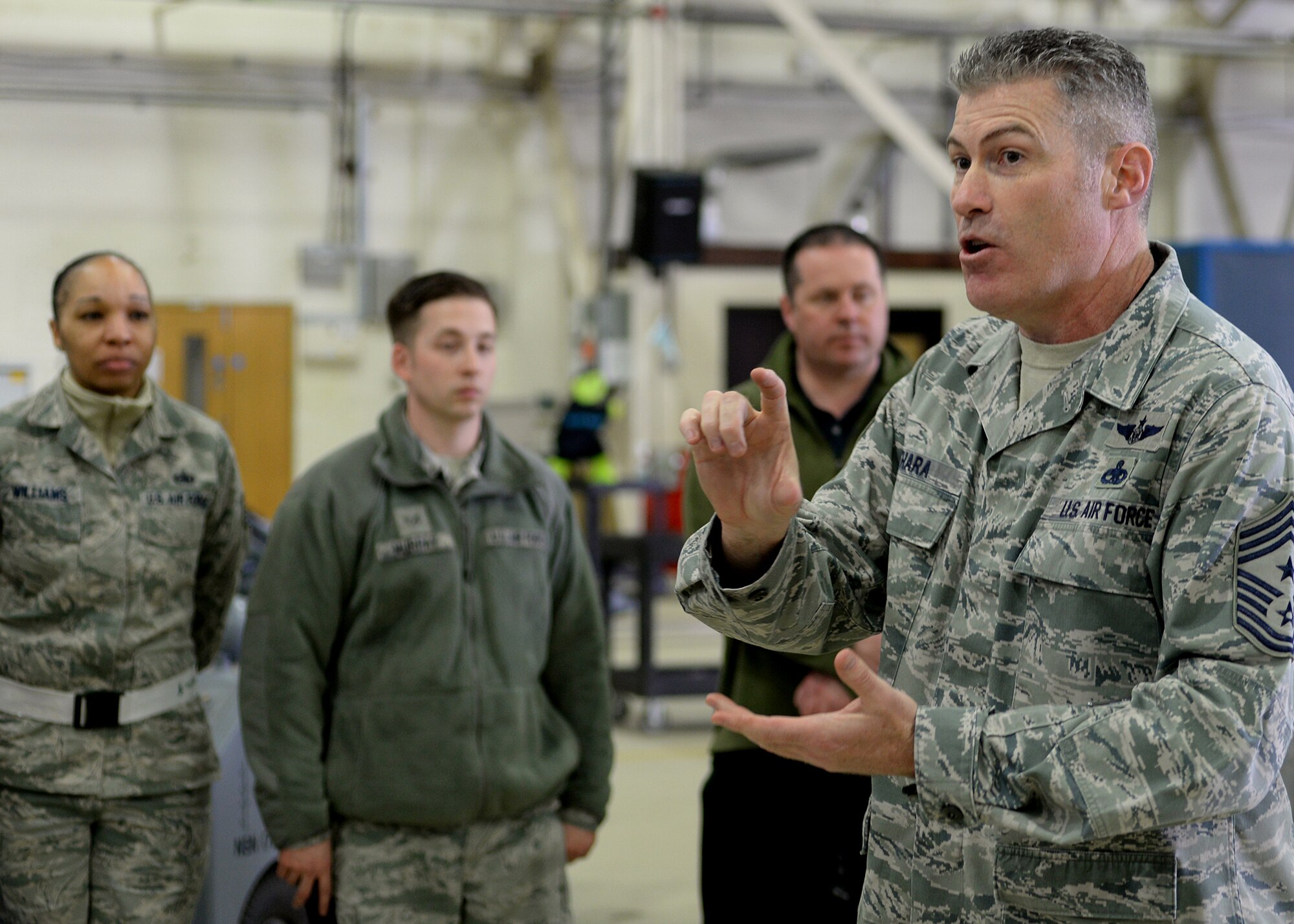 Chief Master Sergeant David O’Hara, 48th Fighter Wing command chief, speaks with Airmen from the 48th Aerospace Ground Equipment flight about the importance of job excellence at Royal Air Force Lakenheath, England, March 30, 2016. During his visit, O’Hara worked side-by-side with AGE Airmen and received an in-depth rundown of the unit’s operations and processes. (U.S. Air Force photo/ Technical Sgt. Matthew Plew)
