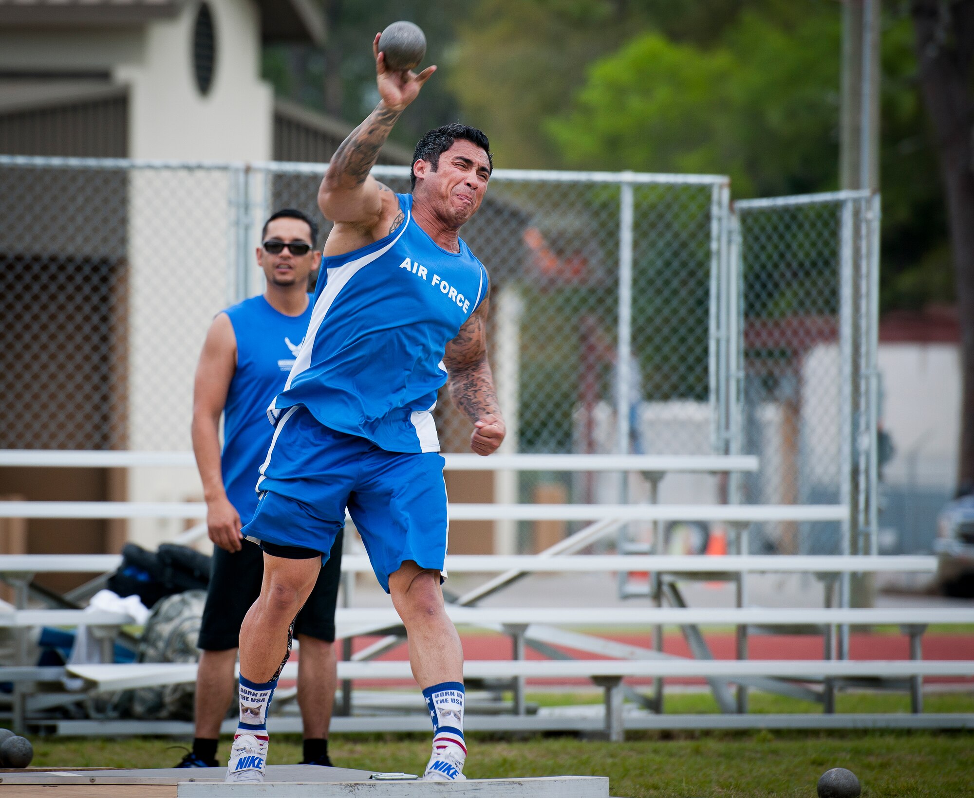 Christopher Ferrell, a Warrior Games athlete, releases his toss during an afternoon track and field session at the Air Force team’s training camp at Eglin Air Force Base, Fla., April 6. The base-hosted, week-long Warrior Games training camp is the last team practice session before the yearly competition in June. (U.S. Air Force photo/Samuel King Jr.)