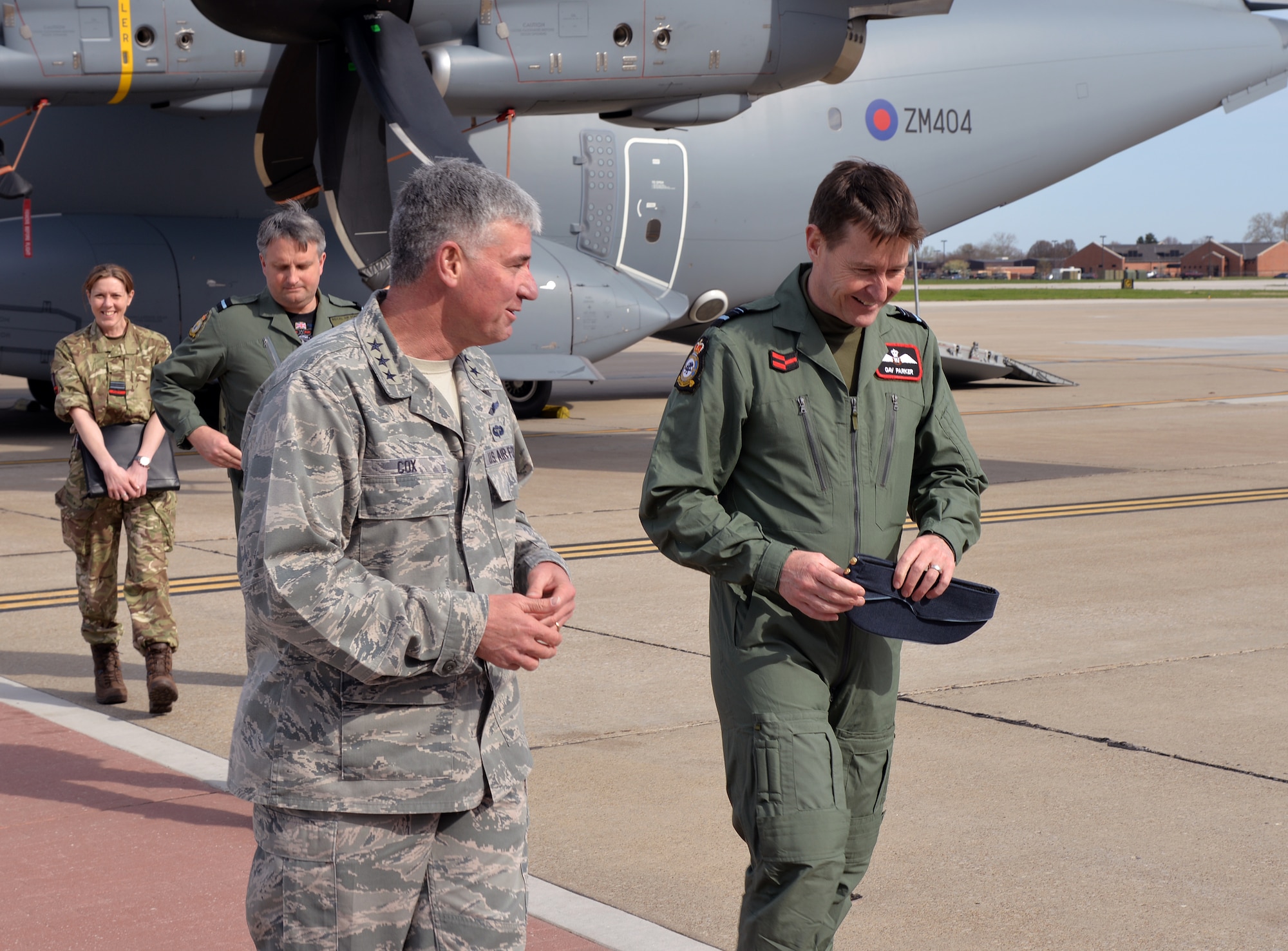 Lt. Gen. Sam Cox, 18th Air Force commander, speaks with British Royal
Air Force Air Vice Marshal Gavin Parker, 2 Group commander and Cox's RAF
equivalent, following a tour of a British A-400M airlifter on the Scott Air
Force Base flightline, April 5, 2016. Parker visited Scott to meet with
Mobility Air Force leaders to get a better understanding of how Air
Mobility Command and 18th AF take a task from genesis to delivery, how the
commands maximize utility and availability of its fleets and how they
exercise command and control of assets employed in remote locations. Over
the last ten years, the RAF has seen its Air Mobility fleet transformed as
they have moved from larger legacy fleets to smaller, more modern airlift
systems. (U.S. Air Force photo by Master Sgt. Thomas J. Doscher)
