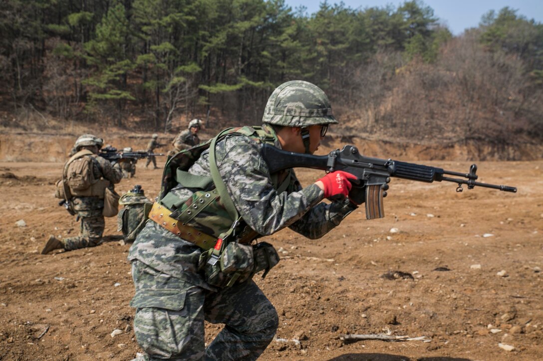 CAMP RODRIGUEZ, South Korea — Republic of Korea Marines and U.S. Marines execute a live fire and maneuver exercise on Camp Rodriguez, South Korea,  as a part of Korean Marine Exchange Program 16-R April 7, 2016. KMEP is a bilateral exercise that gives ROK Marines and U.S. Marines the opportunity to train side-by-side and help improve the relationship between the two nations. The ROK Marines are with 1st ROK Marine Division. The U.S. Marines are with 9th Engineer Support Battalion, 3rd Marine Logistics Group, III Marine Expeditionary Force. (U.S. Marine Corps photo by Cpl. Ryan C. Mains/ Released)