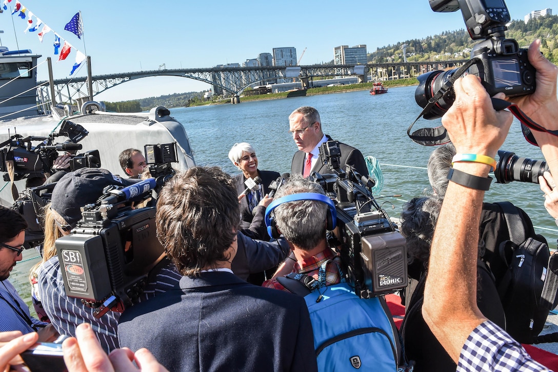 Deputy Defense Secretary Bob Work speaks with reporters following the Defense Advanced Research Projects Agency's christening ceremony for a technology demonstration vessel in Portland, Ore., April 7, 2016. DoD photo by Army Sgt. 1st Class Clydell Kinchen