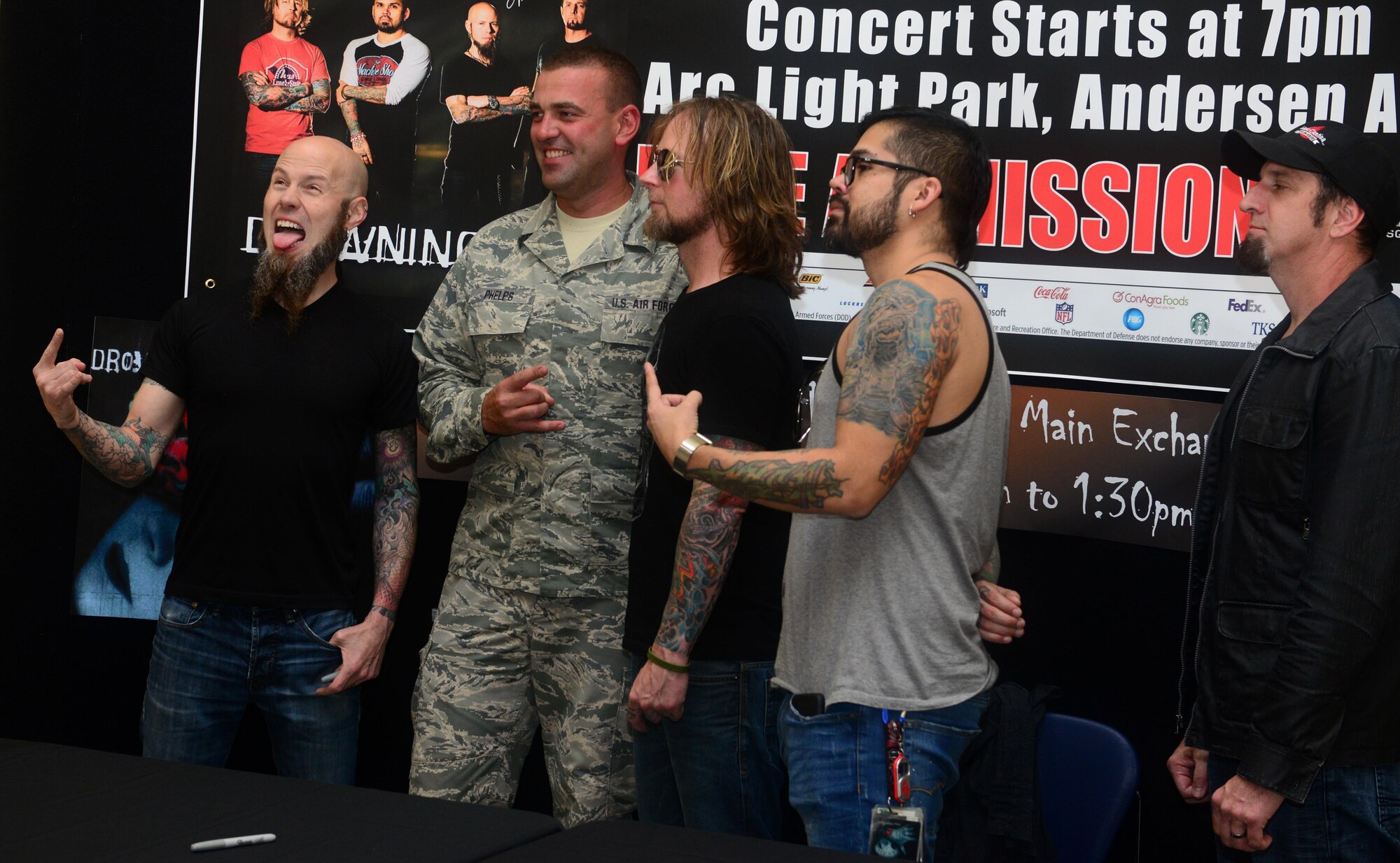 Members of the rock band Drowning Pool met with Team Andersen members April 6, 2016, at Andersen Air Force Base, Guam. Fans had the chance to take photos and receive autographs from the band.  (U.S. Air Force photo by Senior Airman Joshua Smoot)