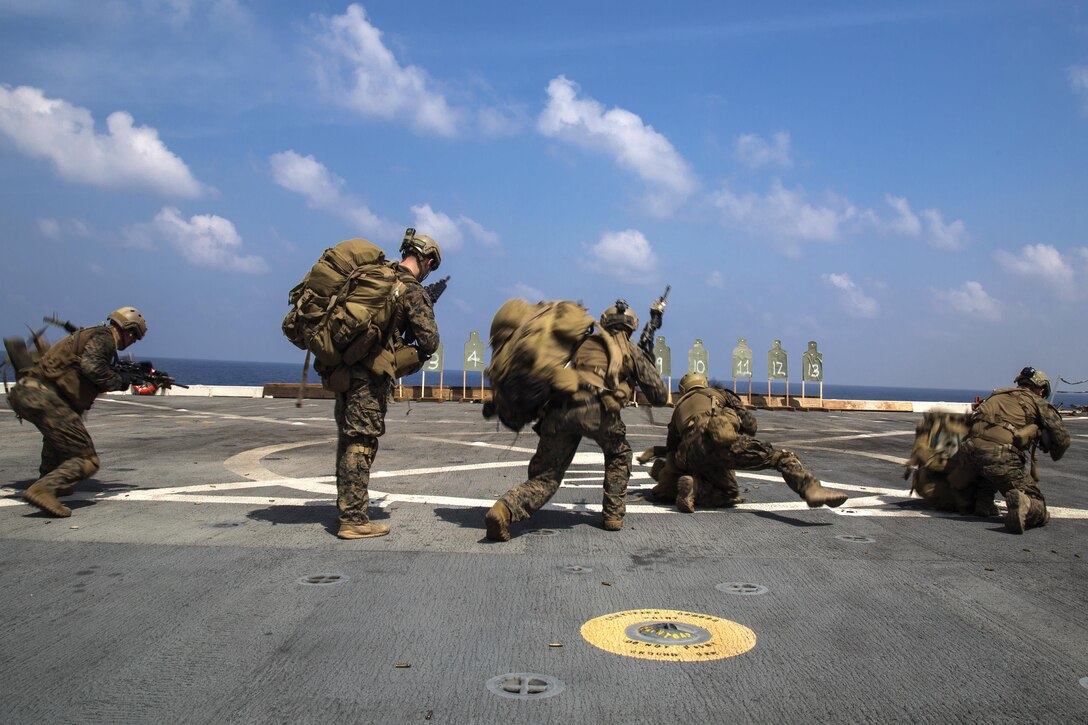 Marines participate in a deck shoot aboard the USS New Orleans in the Pacific Ocean, April 1, 2016. The Marines are assigned to Maritime Raid Force, 13th Marine Expeditionary Unit. Marine Corps photo by Sgt. Hector de Jesus