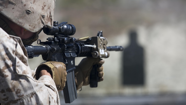 Cpl. Michael Gray, anti-tank missileman with 1st Light Armored Reconnaissance Battalion and student in the Urban Leaders Course fires his M4 Carbine during a combat marksmanship program range at Marine Corps Base Camp Pendleton, California, March 16, 2016. As a portion of the ULC, this range teaches Marines individual marksmanship and movement skills they need in order to move on to more advanced fire-team and squad-based tactics.