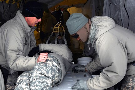 Spc. Benjamin Footman, right, a member of the 438th Chemical Company of the Indiana National Guard, was among the 1,100 Soldiers, Marines, Airmen, Coast Guardsmen and members of the Home Guard of Denmark who participated in an anti-terrorism  exercise this week in northern Michigan.