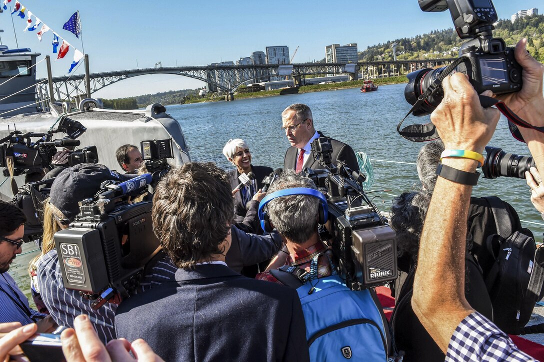 Deputy Defense Secretary Bob Work speaks with reporters following the Defense Advanced Research Projects Agency's christening ceremony for a technology demonstration vessel in Portland, Ore., April 7, 2016. DoD photo by Army Sgt. 1st Class Clydell Kinchen
