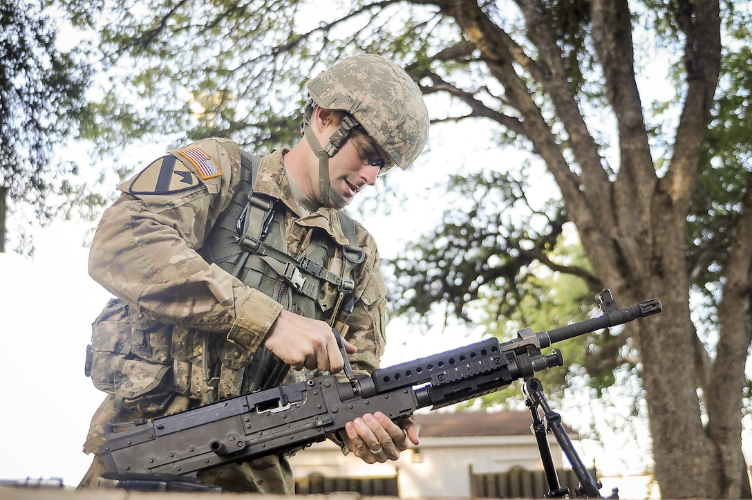 Sgt. Maxwell Buchanan-McGrath, a psychological operations specialist from Bradenton, Fla., representing the 2nd Psychological Operations Group,  competes in the weapons assembly mystery event at the U.S. Army Civil Affairs and Psychological Operations Command 2016 U.S. Army Best Warrior Competition at Fort Hunter Liggett, Calif., April 6, 2016. This year’s Best Warrior competition will determine the top noncommissioned officer and junior enlisted Soldier who will represent USACAPOC in the Army Reserve Best Warrior competition later this year. (U.S. Army photo by Spc. Khadijah Lutz-Wilcox, USACAPOC)