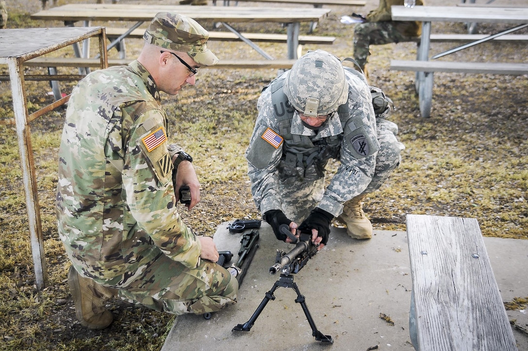 Staff Sgt. Jonathan Stamper, a civil affairs specialist from Hermosa Beach, Calif., representing the 1st Training Brigade, competes in the weapons assembly mystery event at the U.S. Army Civil Affairs and Psychological Operations Command 2016 U.S. Army Best Warrior Competition at Fort Hunter Liggett, Calif., April 6, 2016. This year’s Best Warrior competition will determine the top noncommissioned officer and junior enlisted Soldier who will represent USACAPOC in the Army Reserve Best Warrior competition later this year. (U.S. Army photo by Spc. Khadijah Lutz-Wilcox, USACAPOC)