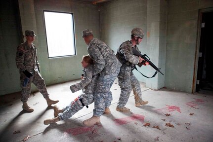 U.S. Army  Sgt. Jon Libby of the 84th Training Command competes in the casualty care lanes during the 11th Aviation Command, 84th Reserve Training Command and Army Reserve Careers Divisions' Joint Best Warrior Competition on Ft. Knox Ky., March 23, 2016. The Best Warrior Competition is a four-day competition that tests competitors' Army aptitude by going through urban warfare situations, board interviews, physical fitness tests, written exams, Warrior tasks and battle drills relevant to today's operational environment. (U.S. Army photo by Sgt. Amber Stephens)