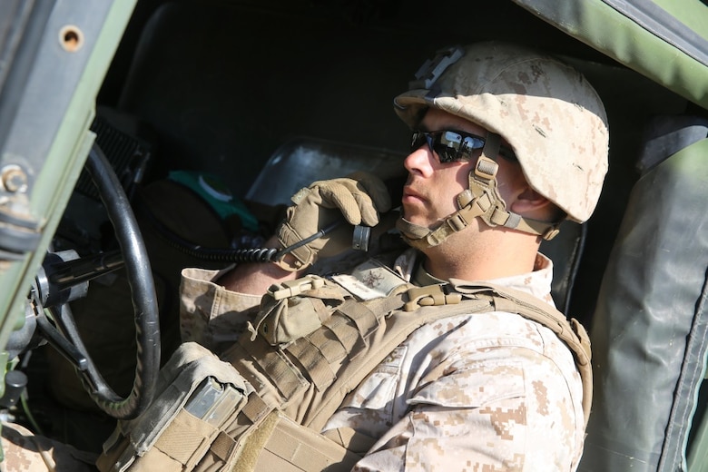 MARINE CORPS BASE CAMP PENDLETON, Calif. - A Marine with Battery Q, 5th Battalion, 11th Marine Regiment, I Marine Expeditionary Force, tests high frequency communications during Spring Fire Exercise at Camp Pendleton March 31, 2016. During the combined arms training exercise, Marines used high frequency communications, which utilizes satellites, to communicate with command centers from miles away. (U.S. Marine Corps Photo by Cpl. Demetrius Morgan/RELEASED)