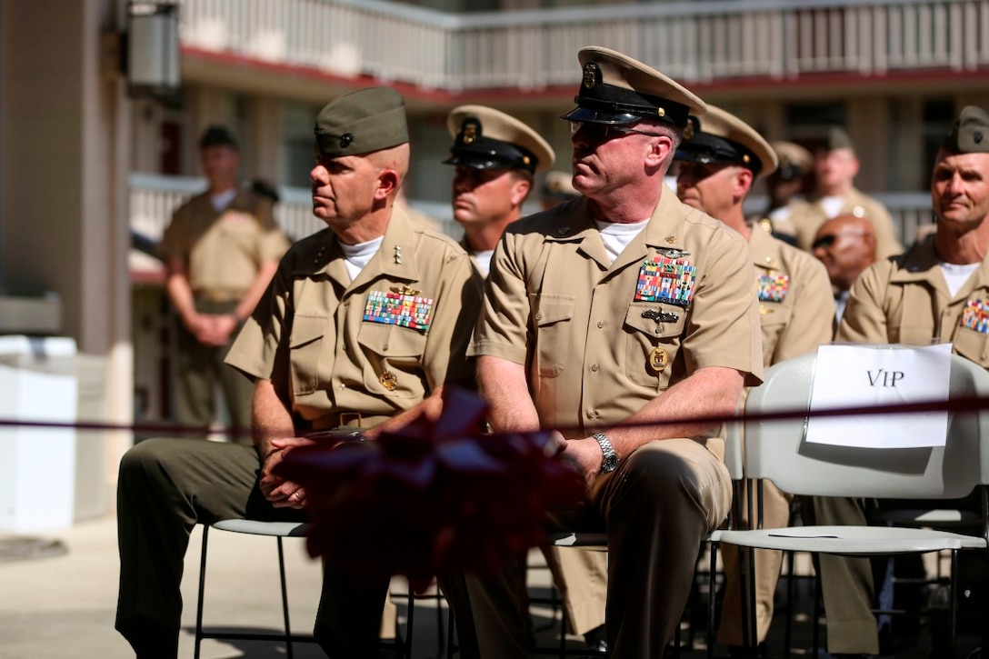 MARINE CORPS BASE CAMP PENDLETON, Calif. – Lt. Gen. David Berger (left), commanding general of I Marine Expeditionary Force, and Master Chief Petty Officer Michael Smith (right), the command master chief petty officer of I MEF, attend a dedication ceremony of Camp Pendleton’s ‘Anchor Up Club’ as a ‘Chiefs Mess’ to the North County Chief Petty Officer Association on April 1, 2016, at Camp Pendleton. Marines with I Marine Expeditionary Force Headquarters Group dedicated the club in celebration of the 123rd birthday of chief petty officers throughout the Navy. The commanding general and sergeant major of I MEF were present to celebrate their longstanding traditions with the Navy and the bond they share. (U.S. Marine Corps photo by Cpl. Angel Serna/Released)